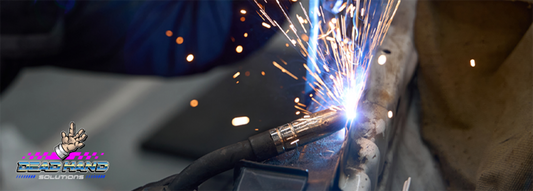 Welding in action with sparks flying