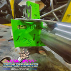 Dead Hand Solutions Chassis Speed Jig holding a Trick tab on a chassis tube, showing flush fit before tack weld